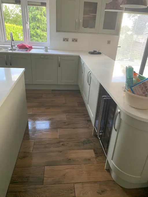 Sage green kitchen with quartz worktop, Bexley