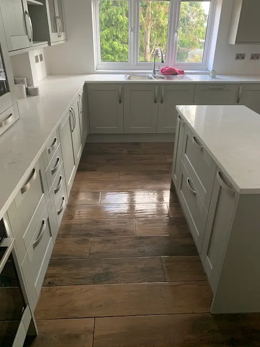 Fitted kitchen island with quartz worktop, Bexley