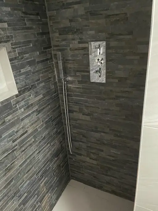 Wet room shower with stone tiling, Bexley
